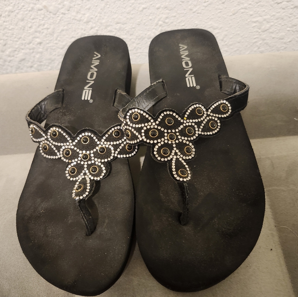 Elegant Black Floral Sandals with Metallic Accents